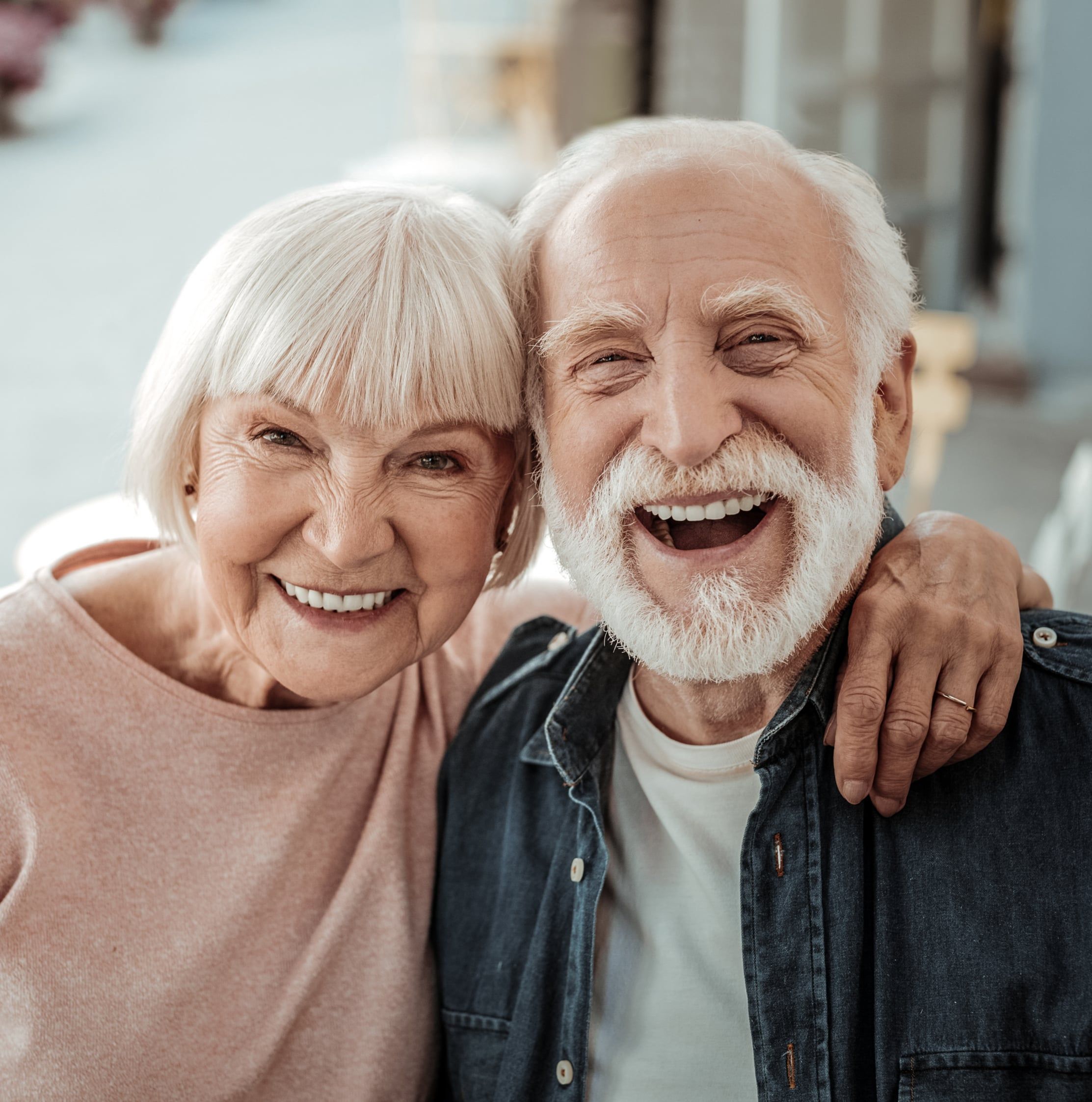 Joyful nice elderly couple smiling